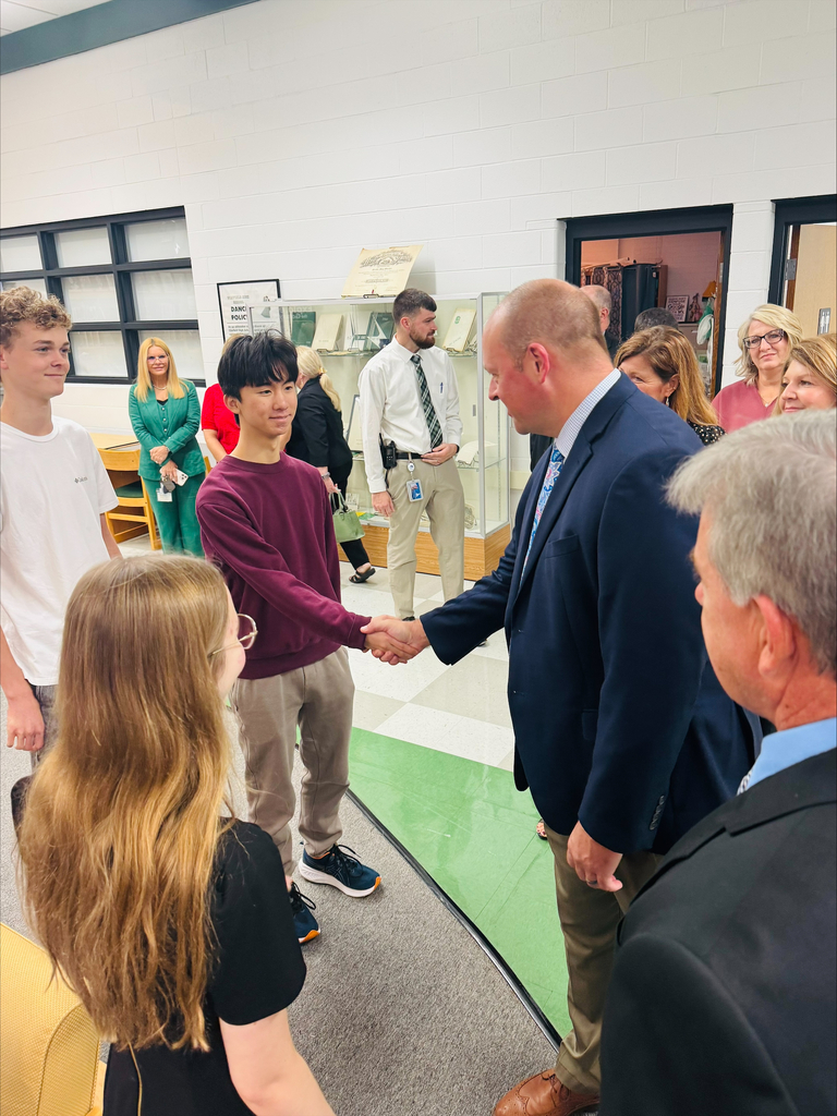 Mr. McLanahan congratulates WHS student 