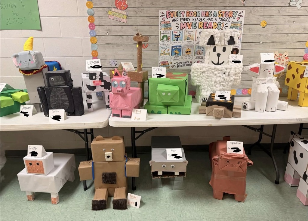 Many farm animals made from shapes on a table