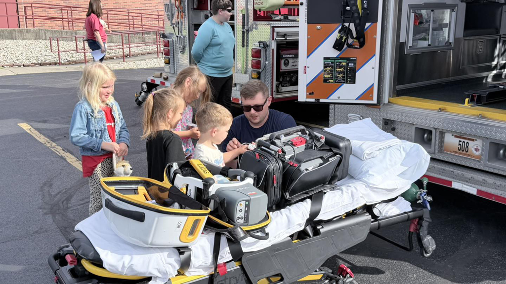 Ambulance Driver showing kids equiptment