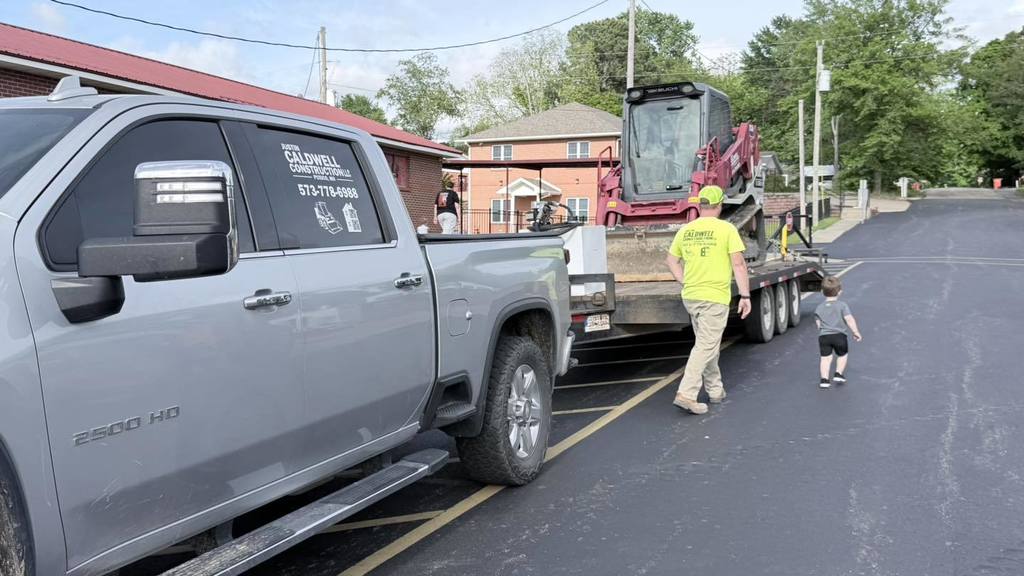 Caldwell Construction truck and bobcat