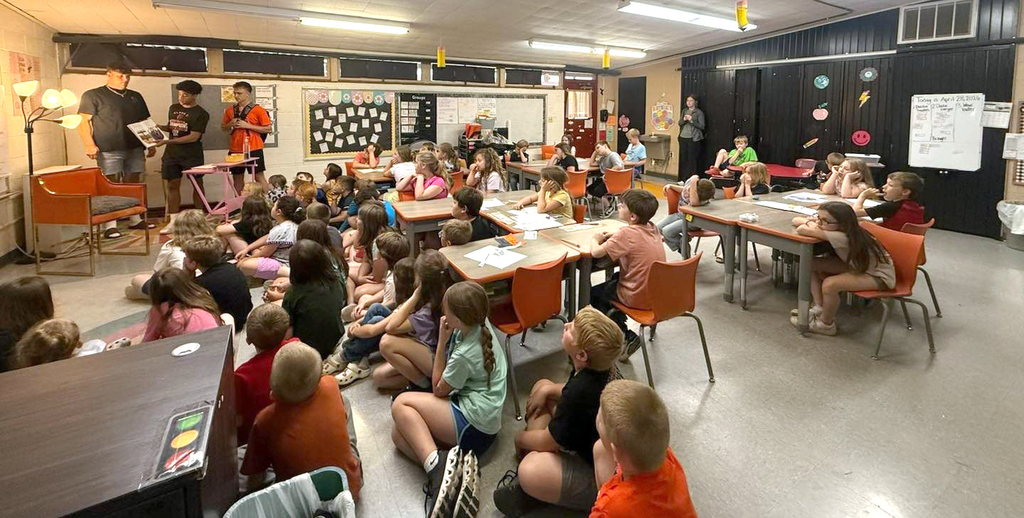 Jett, Landan, and Will Reading to children