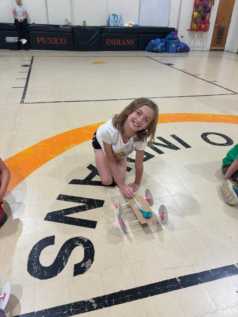 Students learned how to engineer and build their own balloon-powered cars.