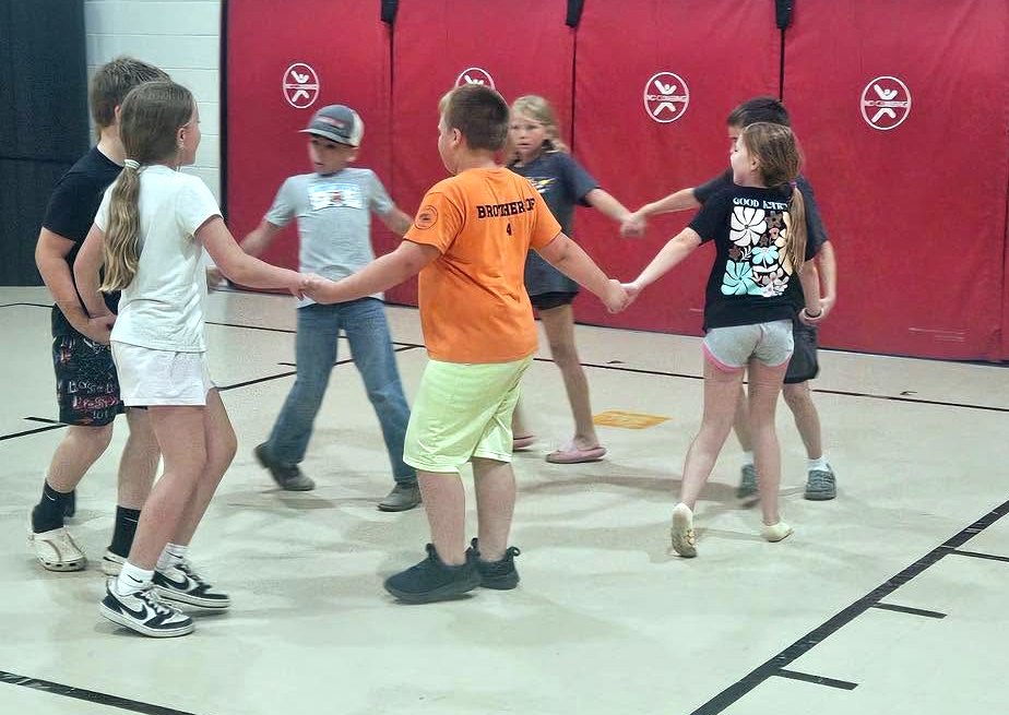 Children square dancing