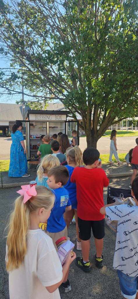 Children at the blessing box