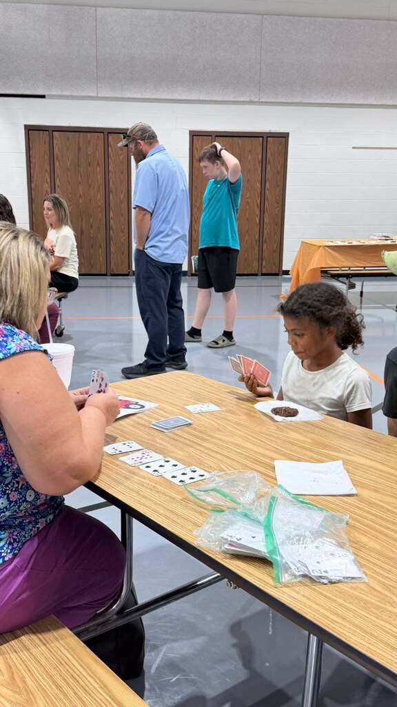 📚🧡 What a wonderful night at Puxico Elementary! 🖤📚 Our Title I Informational Meeting & Book Fair Family Night was a complete success! We had so much fun visiting with our families, sharing information about our Title I program, and watching our students get excited about BOOKS