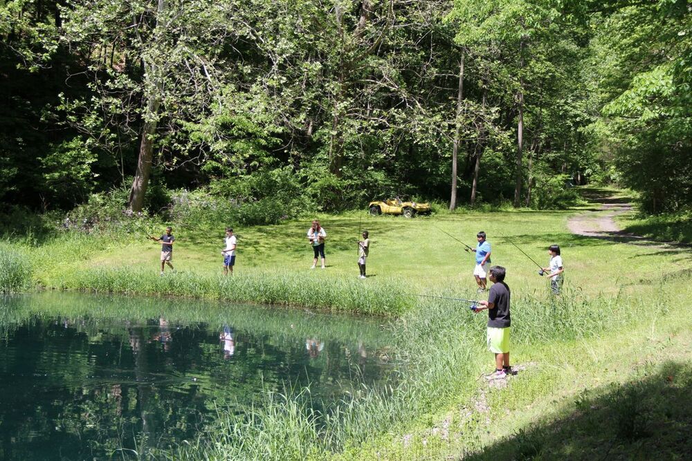 Outdoor school students fish