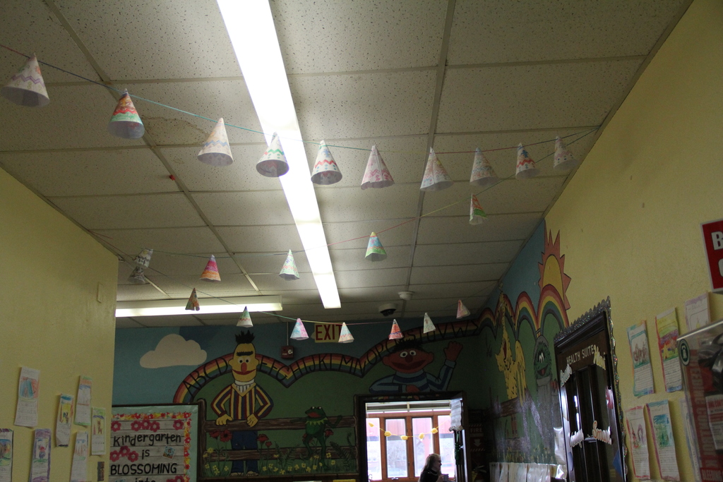 The Kindergarteners at QE are currently learning about the Lakota Sioux—the indigenous people of the Great Plains, and how the buffalo were essential to their survival and spiritual life. They learned that the buffalo were their primary source of food, clothing, and shelter. Students created teepees made of sticks and canvas and created artwork to decorate the halls of QE.