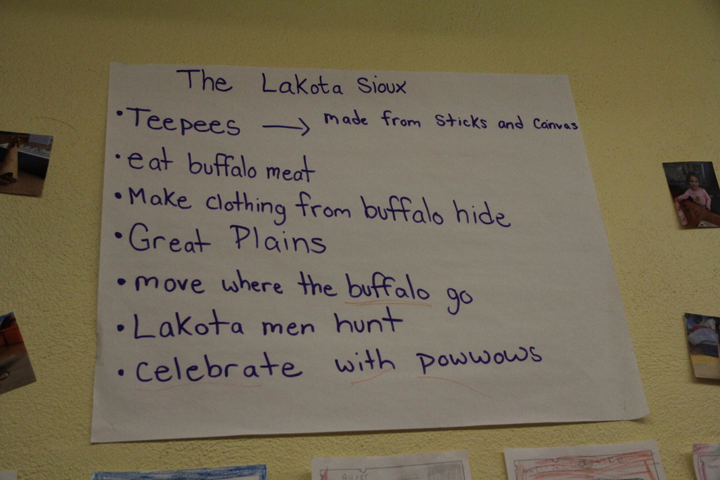 The Kindergarteners at QE are currently learning about the Lakota Sioux—the indigenous people of the Great Plains, and how the buffalo were essential to their survival and spiritual life. They learned that the buffalo were their primary source of food, clothing, and shelter. Students created teepees made of sticks and canvas and created artwork to decorate the halls of QE.
