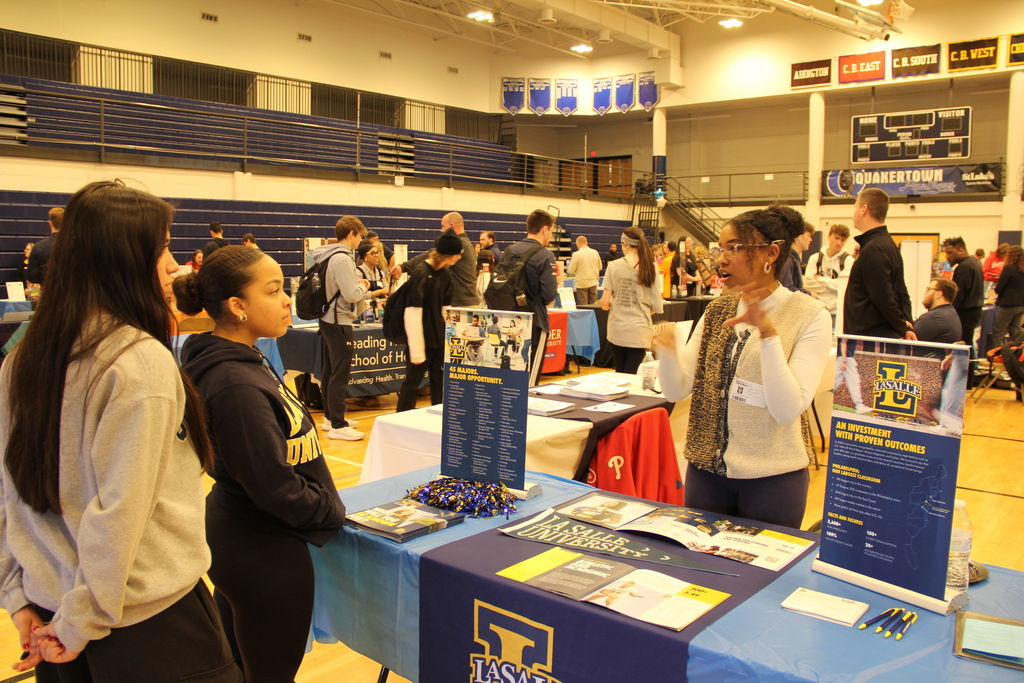 The 12th annual QCHS College Fair will take place on April 16th! We are excited to welcome 82 organizations to our lower gym during the school day.  Juniors & Seniors with last names A-M | 11:35 to 12:10  Juniors & Seniors with N-Z | 12:15 to 12:45   All Sophomores - 12:50 to 1:20  PM technical school students may absolutely attend - Just fill out this FORM: https://docs.google.com/forms/d/e/1FAIpQLSc52gTiJCToxnpwKgl9otY8FucSJ7MD2L9Pots_MU0o2dhCyw/viewform?usp=dialog  Click here to view our vendor list: https://hs.qcsd.org/o/qchs/page/2026-college-fair-vendor-list