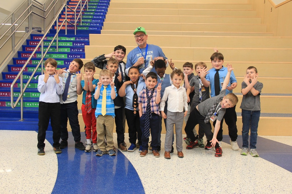 Mr. Godshalk and the mini Godshalks smile for the camera