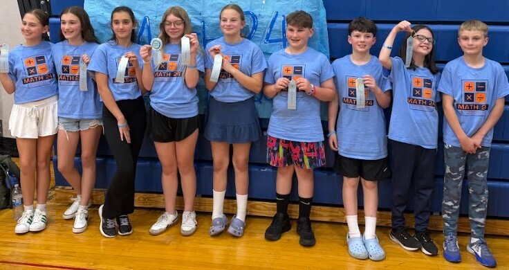 The Trumbauersville Math24 team smile for a group photo.