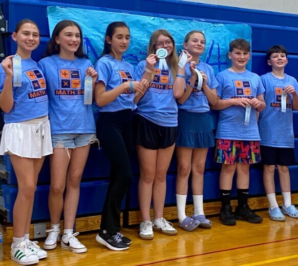 The Trumbauersville Math24 team smile for a group photo.