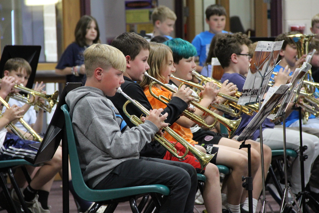 students playing trumpets at band concert