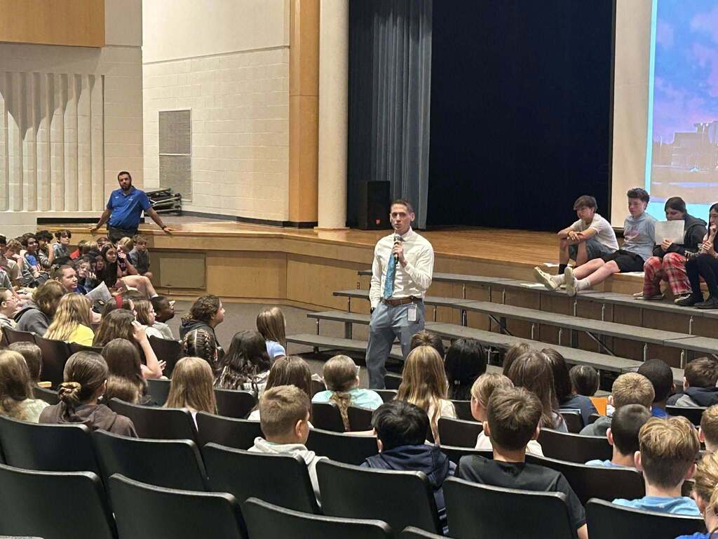 Sixth Graders gather in the Strayer auditorium to hear from Principal Dr. Crater