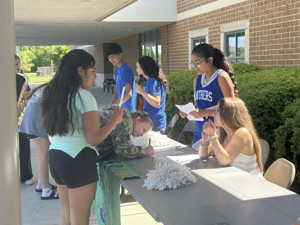 Students chat with club representatives