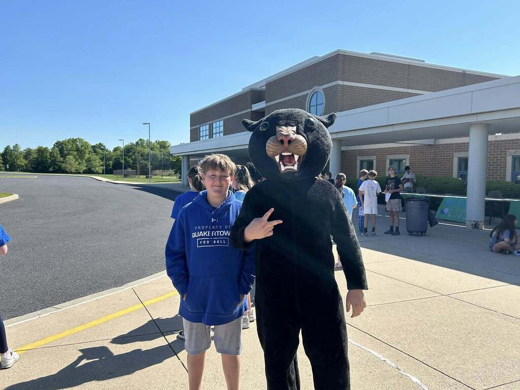 The Panther waits for the sixth graders to arrive outside