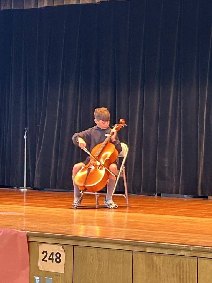 Student plays the cello at the Richland Talent Show
