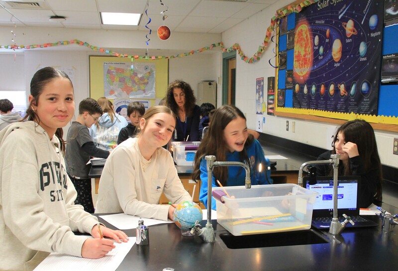 Students sketch the position of the Earth and Sun during each season.
