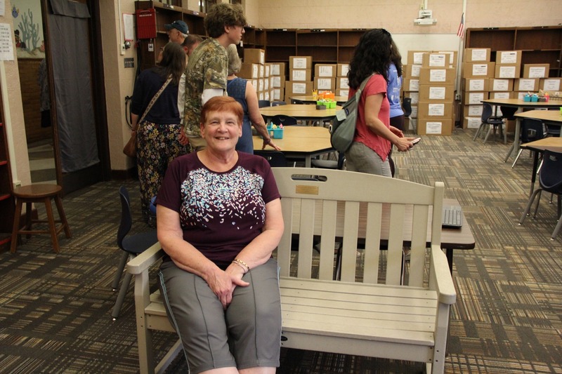 Former Building Administrator, Mrs. Detweiler sitting on "her bench"