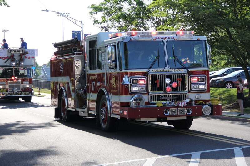 A firetruck driving down the road