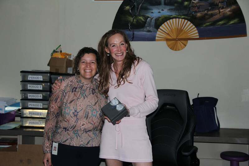 Dr. Hoffman and Mrs. Hayes smile for a photo
