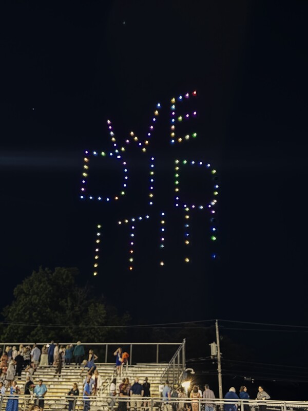 Drones write "We Did it!" in the sky