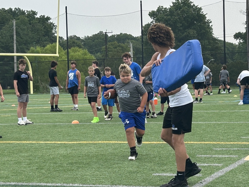 Kids practicing Football drills