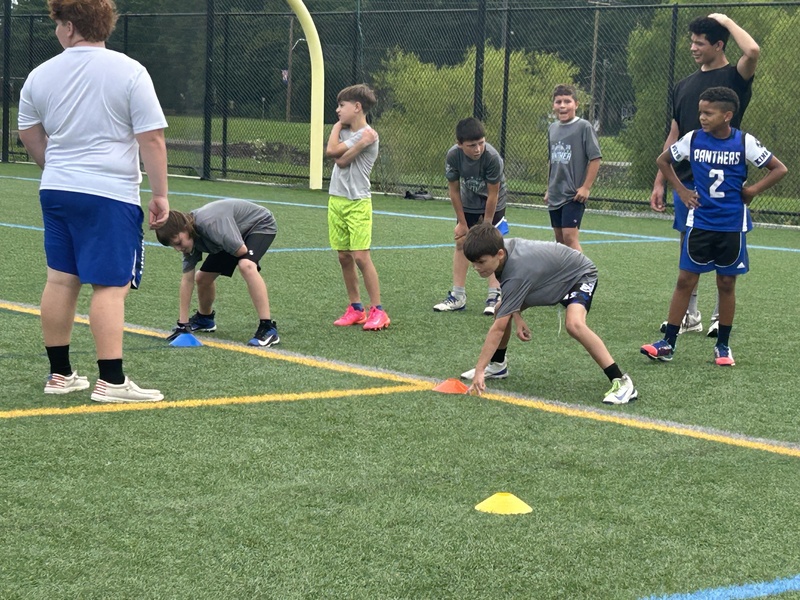 Kids practicing Football drills