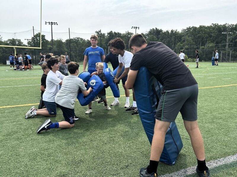 Kids practicing Football drills