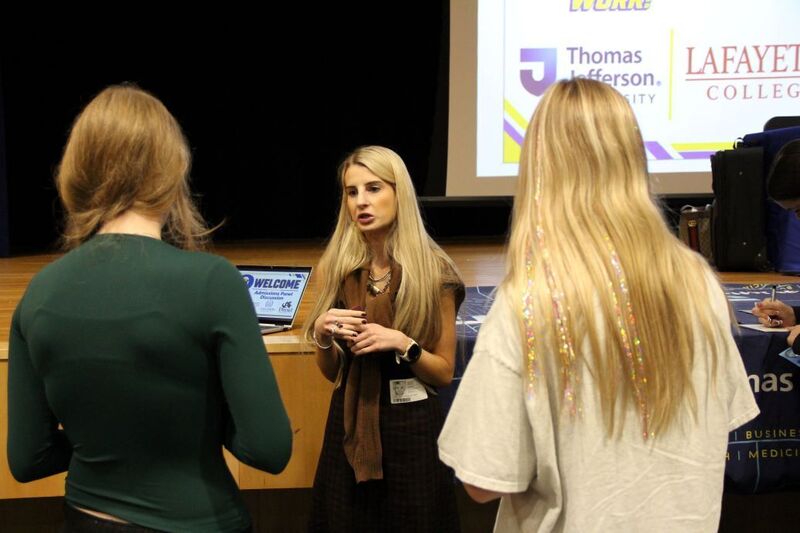 Students chat with representatives and ask questions