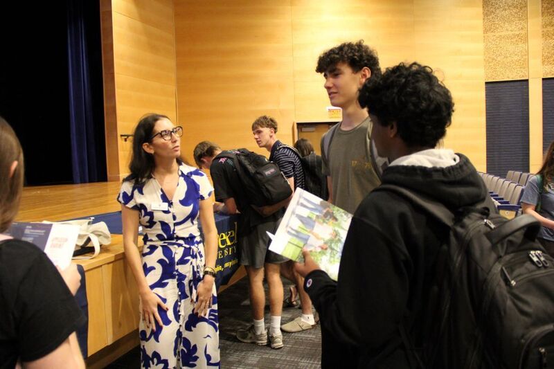 Students chat with representatives and ask questions