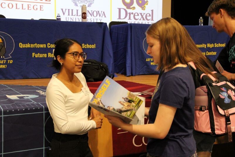 Students chat with representatives and ask questions