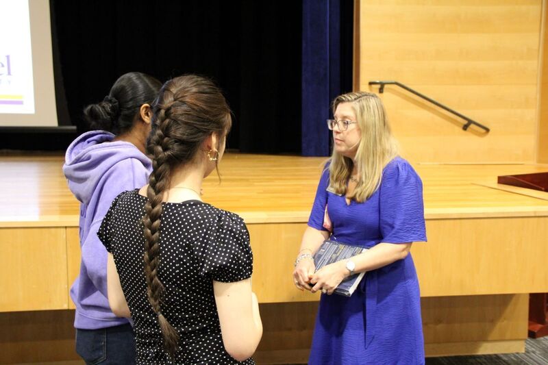 Students chat with representatives and ask questions