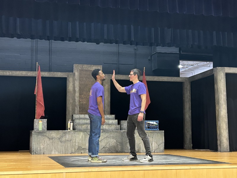 Actors demostrate how to perform a stage slap