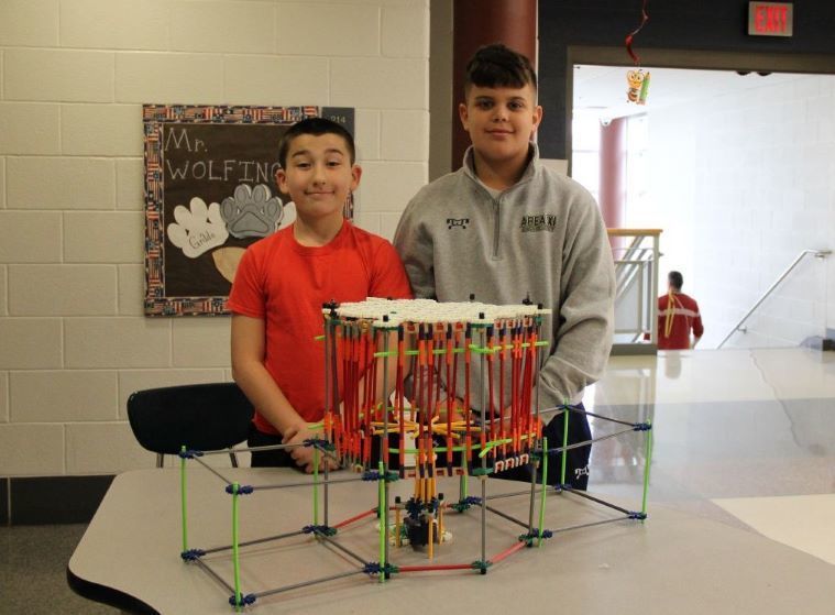 Smoke Cleaning Machine Team: Grayson and Thor / The Infinity Stones pose for a photo with their invention