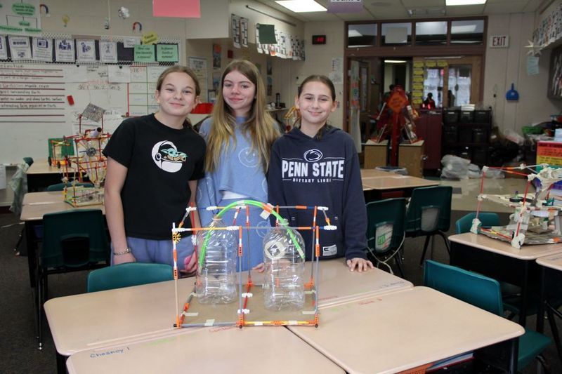 Team "The Biod Guard" pose with their invention