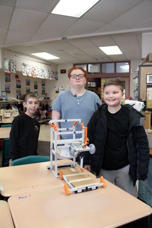 Team ARF poses with their invention