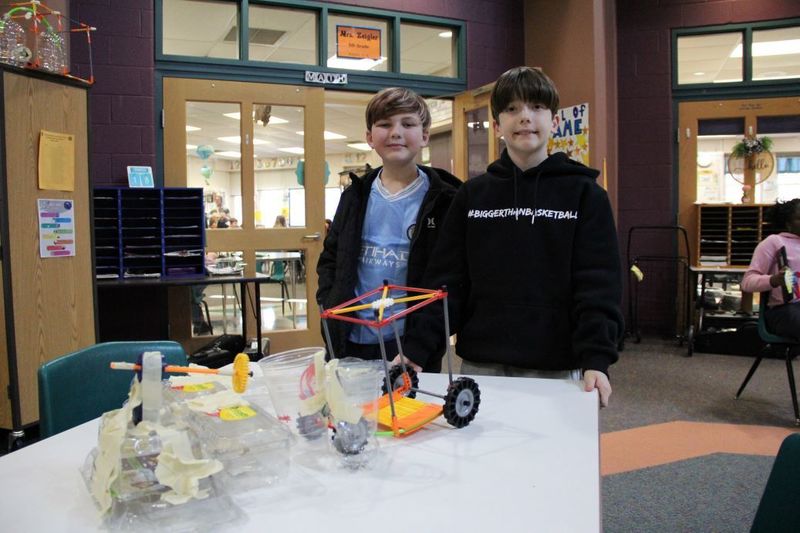 Team "The Trash Netters" pose with their invention.