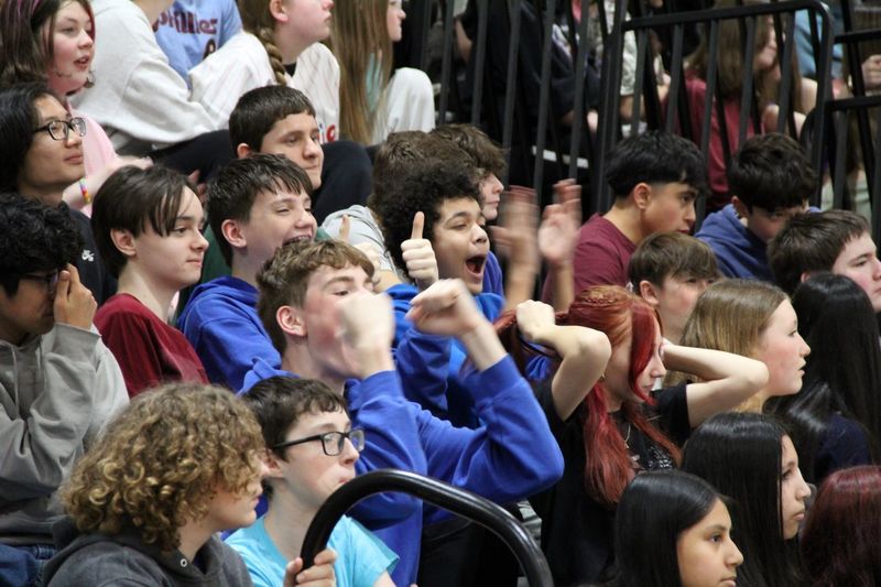 Students cheer on their classmates