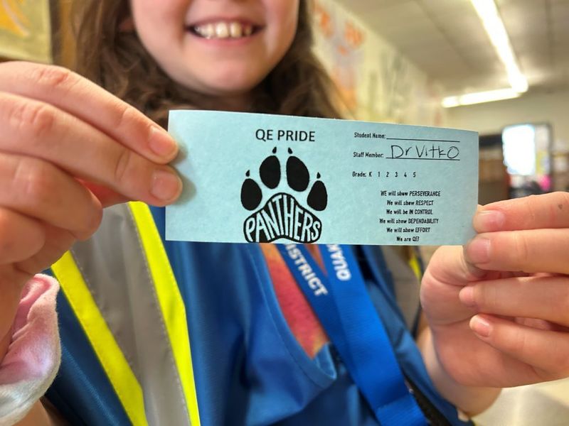 Grace proudly shows her special "Dr. Vitko" PRIDE Tickets