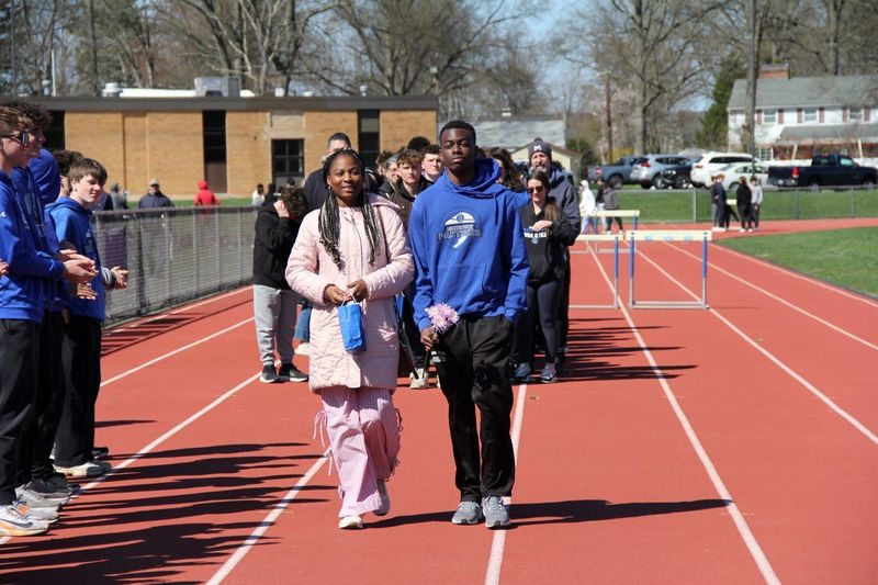 Senior David Adebayo celebrated at Boys Track and Field Senior Night.