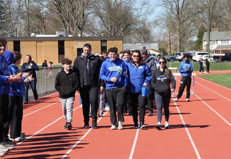 Senior Tyler Burgy celebrated at Boys Track and Field Senior Night.