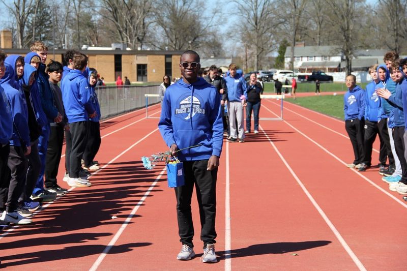Senior Kaiden Roache celebrated at Boys Track and Field Senior Night.