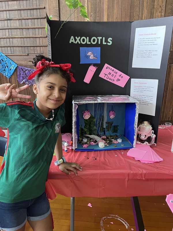 Students pose with their Cultures Day presentation
