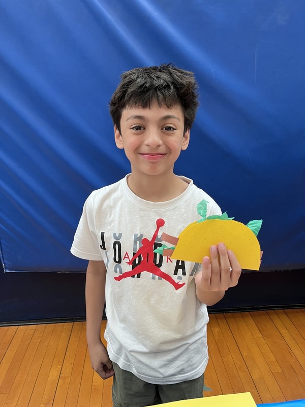 Students pose with their Cultures Day presentation