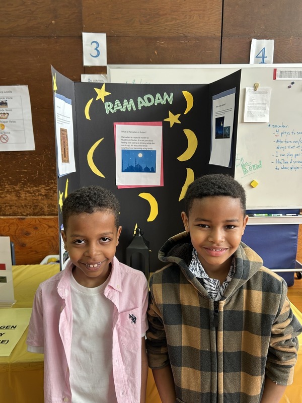 Students pose with their Cultures Day presentation