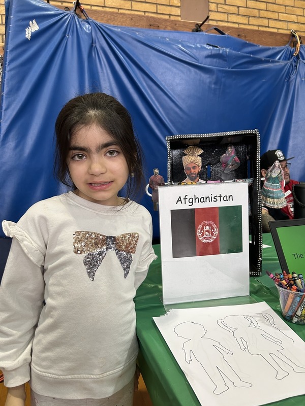 Students pose with their Cultures Day presentation