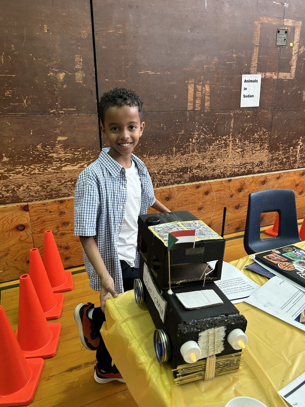 Students pose with their Cultures Day presentation