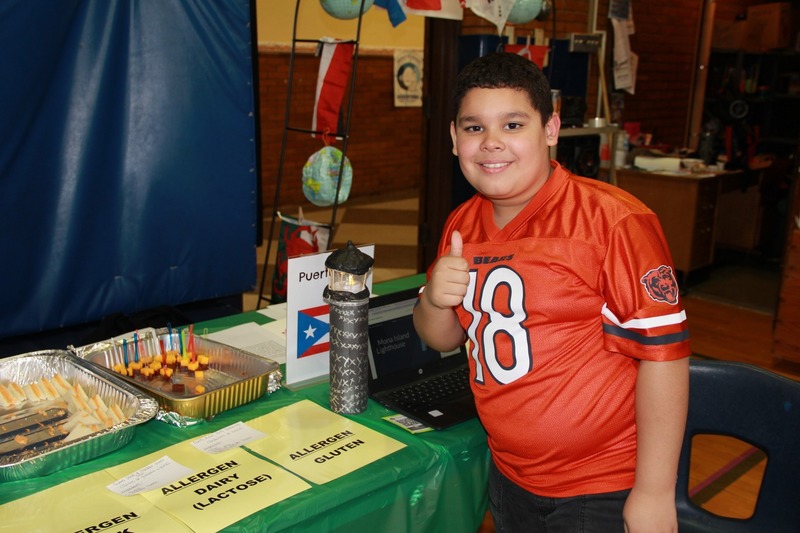 Students pose with their Cultures Day presentation