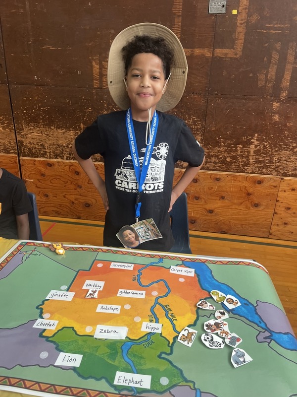 Students pose with their Cultures Day presentation